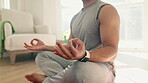 Man, yoga and lotus hands for home meditation, fitness and holistic training on living room floor in healing energy. Calm, peace or person with mindfulness, chakra and breathing exercise for wellness