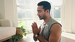 Meditation, pray hands with man and yoga at home, fitness and mindfulness with zen, calm and spiritual. Prayer, peace and exercise in living room, health and wellness for healing and self care