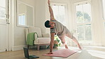 Man, yoga and stretching on laptop for home training, fitness and holistic or wellness, virtual class or video streaming. Person in triangle pose for pilates workout, exercise or balance on computer