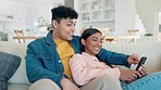 Phone, happy and couple talking in home living room, bonding and relax together on social media. Smartphone, man smile and woman on sofa in lounge, online shopping or scroll app on internet website