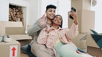 Happy couple, real estate and video call, social media or moving in new home together in live streaming. Excited man and woman relax with smile and boxes in online vlog, property or house renovation