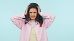 Stress, headache and face of woman in studio with anxiety for fake news, mistake or gossip on blue background. Pain, portrait and lady model with head shake oops emoji for stop, wrong or choice fail