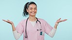 Doctor, hands and presentation or choice for healthcare service, health insurance and woman advertising in studio. Face of medical nurse and palm to show advice, option and yes on a blue background