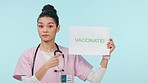 Nurse, face and important vaccination sign of a woman pointing to wellness, healthcare and shot banner. Vaccine and portrait with health opinion, message and medical advice with blue background