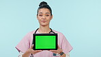 Doctor, woman and tablet green screen, yes for healthcare and clinic presentation, advice or nodding on blue background. Young nurse or medical student with digital mockup, tracking marker and studio