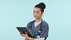Woman, doctor and tablet in research, healthcare results or Telehealth against a studio background. Female person, medical or nurse working on technology for online search or networking on mockup