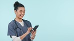 Nurse, woman laugh and phone for healthcare communication, social media meme or funny chat in studio. Student or medical doctor on mobile and telehealth mockup or happy advertising on blue background