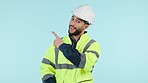 Architect, construction worker and studio man point at engineering design, mockup plan or advertising project space. Logistics portrait, industrial decision and architecture engineer blue background