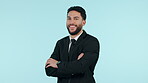 Face, arms crossed and happy business man in studio isolated on a blue background mockup space. Portrait, professional smile and confident corporate lawyer in suit, employee and worker in Brazil 