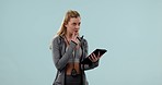 Thinking, fitness and woman with a tablet, typing and exercise on a blue studio background. Person, girl and model with technology, solution and research with problem solving, connection and decision