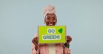 Black woman, poster and climate change with sustainability, green and activism with smile isolated on blue background. Promotion for clean environment, Earth Day and charity, help and care in studio