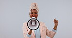African woman, megaphone and protest, voice or power and broadcast or announcement on a white background. Face of person, leader or speaker and fist, call to action and attention or warning in studio