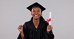 Excited black woman, graduation and celebration with certificate, diploma or winning against a studio background. Portrait of happy African female person, student or graduate with degree in success
