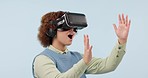 VR glasses, excited business woman and hands with metaverse, virtual reality and futuristic game in studio. Technology, gamer software and professional with 3D and online tech with blue background