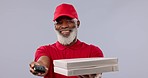 Senior, black man and pizza box with pos machine for delivery, fast food or payment against a studio background. Portrait of mature African male person or courier guy giving meal, order or parcel