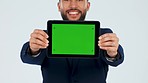 Tablet, presentation and green screen with face of man in studio for logo, social media or deal on white background. Digital, display and portrait of guy model show mockup for brand, web or ux design