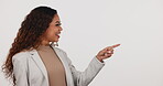 Smile, pointing and business woman with a checklist, menu or presentation on white background in studio. Timeline, bullet point or info on a chart with a young employee showing the contact process