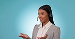 Call center, communication and woman in studio for customer service, FAQ advisory or IT questions. indian telemarketing agent, virtual consultant or telecom contact with microphone on blue background