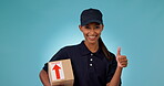 Happy woman, delivery and box with thumbs up in success or winning against a studio background. Portrait of female person or courier lady smile with like emoji, yes sign or OK in logistics or package