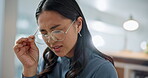 Business, asian woman and headache take off glasses for stress, eye pain or anxiety with company risk and bokeh. Professional, person and rubbing head for migraine with burnout, depression or health