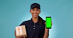 Happy woman, delivery and box with phone green screen in advertising against a studio background. Portrait of female person or courier lady smile in logistics with mobile smartphone display or mockup