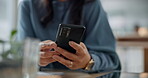 Hands, phone and an asian woman employee in her office for communication or networking on a design. Mobile, social media or text message app with a confident and creative young person in business