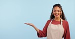 Studio woman, happy barista and palm gesture with cafe product placement, coffee shop promotion or mockup space. Advertising waitress, presentation portrait and server announcement on blue background