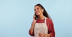Small business, phone call and happy woman in studio with coffee shop, startup or conversation on blue background. Cafe, questions and lady boss with smartphone discussion for loan, planning or deal