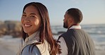 Walking, beach and face of couple holding hands by ocean for commitment, bonding and relax in nature. Happy, travel and portrait of man and woman for romance on holiday, vacation and anniversary