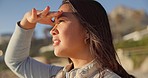 Travel, view and face of woman at beach for relaxing on holiday, vacation and weekend outdoors. Tourism, nature and person looking at waves, sunset and ocean for calm, reflection and peace by sea