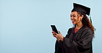 Graduation student, woman laughing and phone on marketing space, contact and social media chat in studio. Happy african graduate on mobile for funny meme, college news or education on blue background