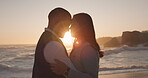 Couple at the beach, sunset and silhouette with people in relationship, forehead touch or hug by the ocean. Travel, love and romance with vacation, trust and together outdoor with peace and calm