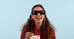 Woman, 3d glasses and laugh with popcorn in studio, comedy movie or joke by blue background. Girl, eating snack and holographic vision for comic show, crazy or film in cinema, theater or television