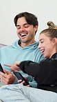 Phone, laughing and couple watching video of funny, comedy and comic joke on social media. Happy, technology and young man and woman scroll on internet on cellphone together in bedroom at apartment.