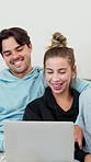 Laptop, love and couple watching a movie together relaxing in bed on a weekend morning at home. Happy, smile and young man and woman streaming film, show or video on computer in bedroom at apartment.