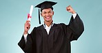 Graduation, success and man with fist and celebration, event and education achievement on blue background. Portrait, certificate and university graduate with winning, cheers and happiness in studio