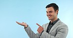 Happy, pointing and face of businessman in studio with choice, option or decision hand gesture. Smile, mockup and portrait of professional male lawyer from Canada show marketing or advertising space.