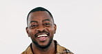 Face, smile and funny with a black man closeup in studio on a white background for comedy or humor. Portrait, happy comic and a young person laughing at a joke or meme with energy or freedom