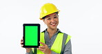 Engineering woman, tablet green screen and industrial presentation for renovation, architecture or design in studio. Face of construction worker or asian person on digital mockup and white background