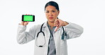 Woman, doctor and thumbs down to green screen of phone for medical mistake, wrong advice or fake news in studio. Portrait, asian healthcare worker or vote no sign to mobile mockup on white background