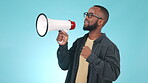 Black man, megaphone and protest, fight and politics with human rights on blue background. Communication, equality and political movement, empowerment and activism with call for action in studio