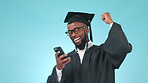 Graduation, phone or happy student with education, college or university scholarship results. Online mobile app, black man or graduate in studio for success, good news or goal on blue background