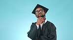 Thinking, graduation and education with a black man student in studio on a blue background for learning. Idea, vision and planning for the future with a university graduate looking for opportunity