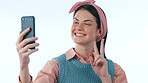 Selfie, fashion and peace sign with a social media woman in studio on a blue background for a profile picture. Phone, smile and a happy young influencer or content creator posing for a status update