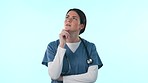 Nurse, thinking and decision in healthcare with questions, ideas or mockup of problem solving on blue background in studio. Medical, planning and confused woman with faq, information or doubt