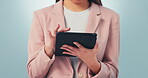 Hands, tablet and research with a business woman reading information closeup in studio on a gray background. Technology, app or social media with a corporate employee online to search for data