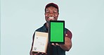 Delivery man, box and tablet in studio, green screen and face for supply chain app by blue background. African courier, package and touchscreen for branding, logistics and mockup space for shipping