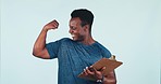 Clipboard, fitness and black man flexing arms in studio for muscle and body building training. Checklist, sports and young African male personal trainer with biceps isolated by white background.