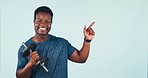 Black man, fitness and pointing with dumbbell for advertising or weightlifting against a studio background. Portrait of happy African male person showing deal or sale discount for workout or exercise