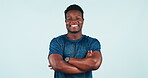 Happy black man, fitness and professional with arms crossed against a studio background. Portrait of muscular African male person, bodybuilder or athlete smile for workout, training or exercise